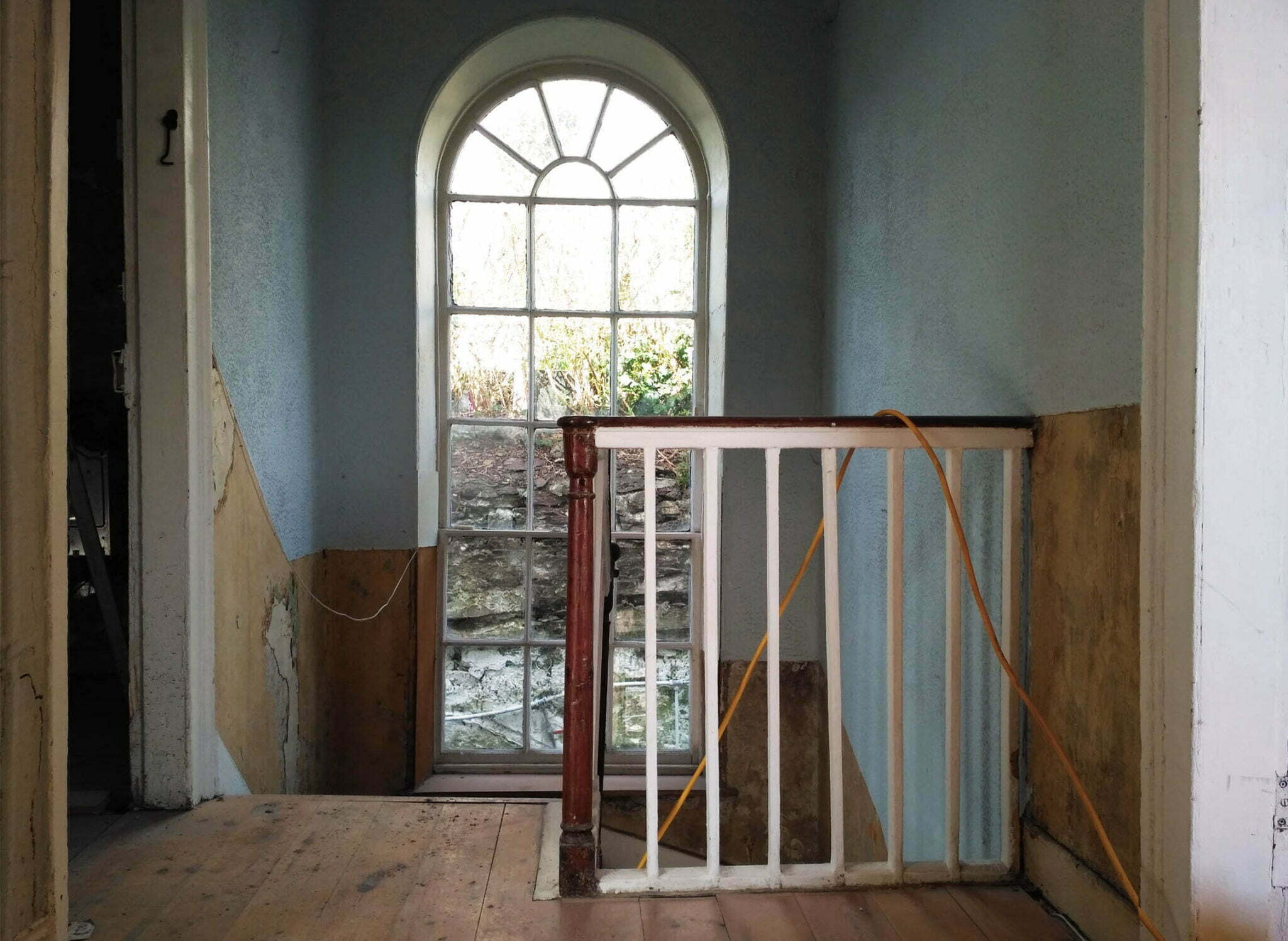 Arched Window On The Landing